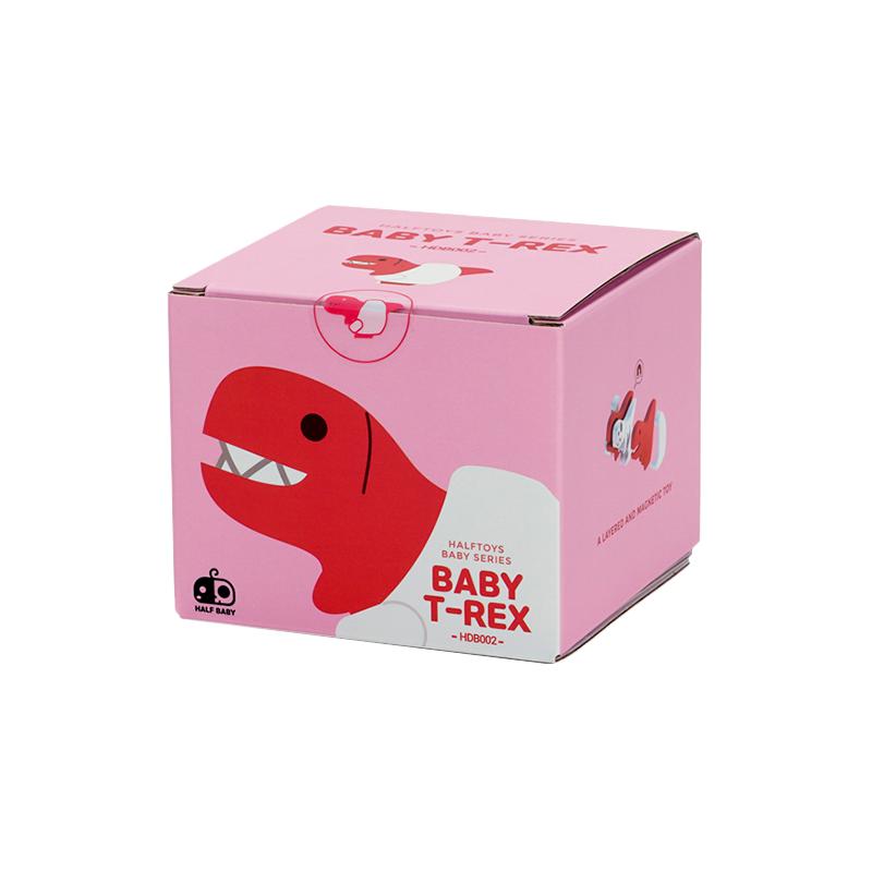 Image of the packaging for the Baby T-Rex and Crib figurine toy. It is a pink cube box with a 2D picture of the figurine on the side.