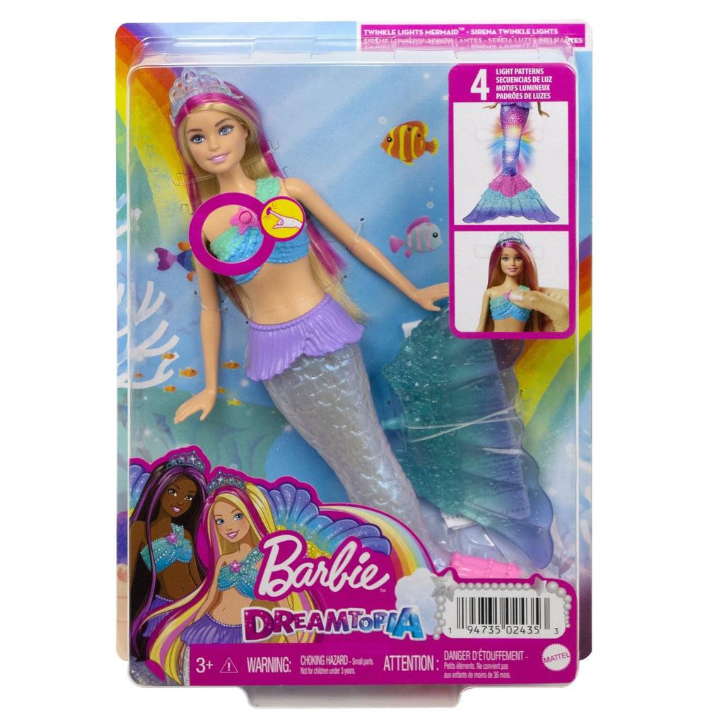 Image of the packaging for the Barbie Dreamtopia Twinkle Lights Mermaid Doll. The front is made from clear plastic so you can see the doll inside.