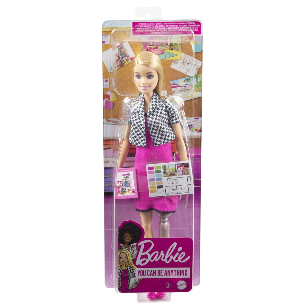 Image of the packaging for Barbie Interior Designer Doll w/ Prosthetic Leg. The front is made from clear plastic so you can see the doll inside.