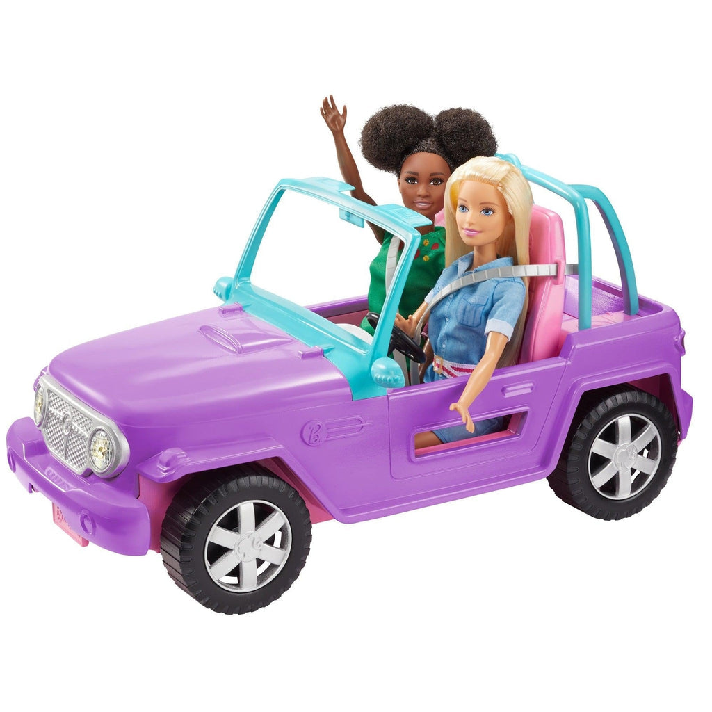 Scene of Barbie riding in the vehicle with her friend. The car is purple with a blue window frame.