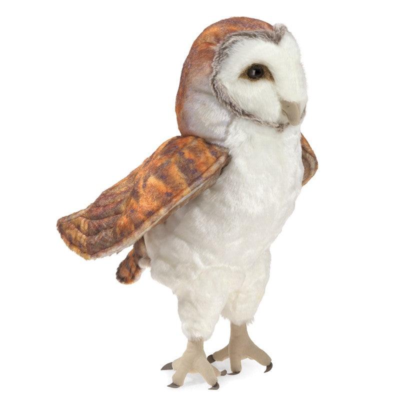 Front of puppet | Owl has a white plush body, tan feet and beak, and dark brown fabric talons. | Eyes are brown plastic and surrounded by tan fur.