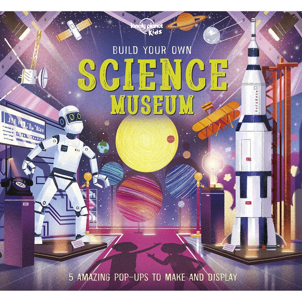 Image of the cover for the Build Your Own Science Museum book. On the front is an illustration of the inside of a science museum complete with rocket ships and robots.