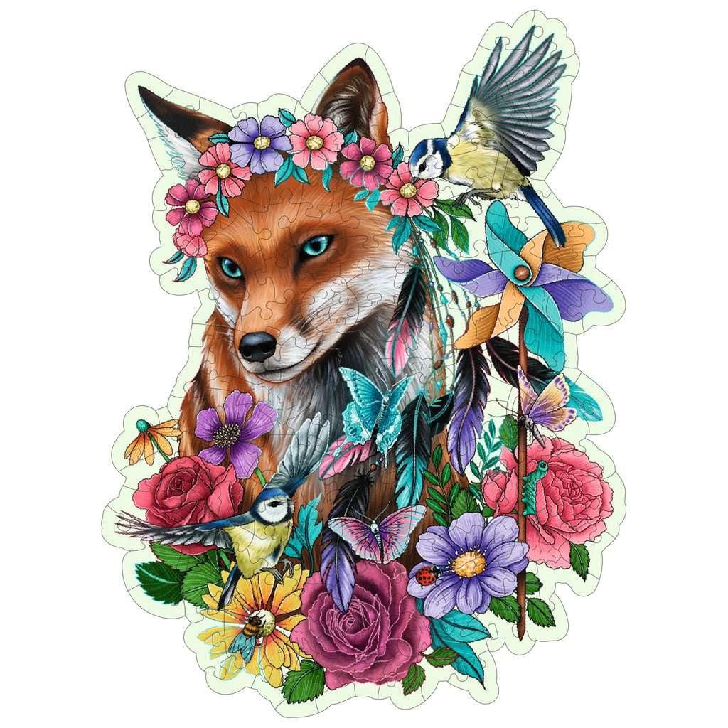 Image of the finished puzzle. It is a sillhouette puzzle of a fox surrounded by flowers and birds while wearing a flower crown.
