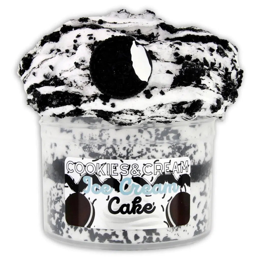 Image of the open Cookies & Cream Ice Cream Cake slime. It is a white and black colored slime that comes with an oreo-like charm.