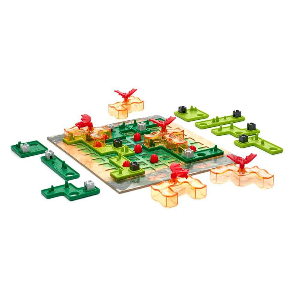 Image of the fully set up board game. It comes with a base, differently shaped house and property pieces in two colors of green, and differently shaped dragon's fire pieces.