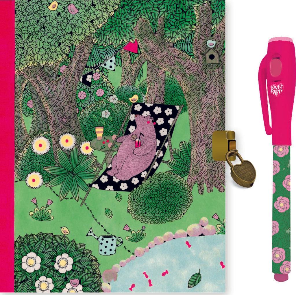 Image of the Fanny Magic Pen Secret Journal. On the front is an illustration of a bear relaxing in a beach chair drinking lemonade in the woods. The included pen matches.