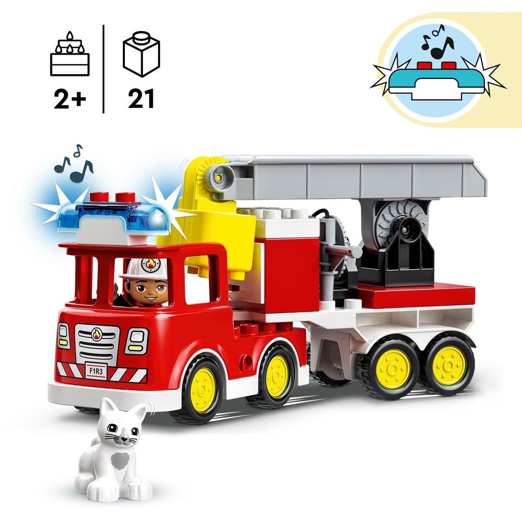 fireman driving the truck with cat in front of it and the siren lit up | lights and sounds indicator in top right | piece count of 21 and age of 2+ in top left