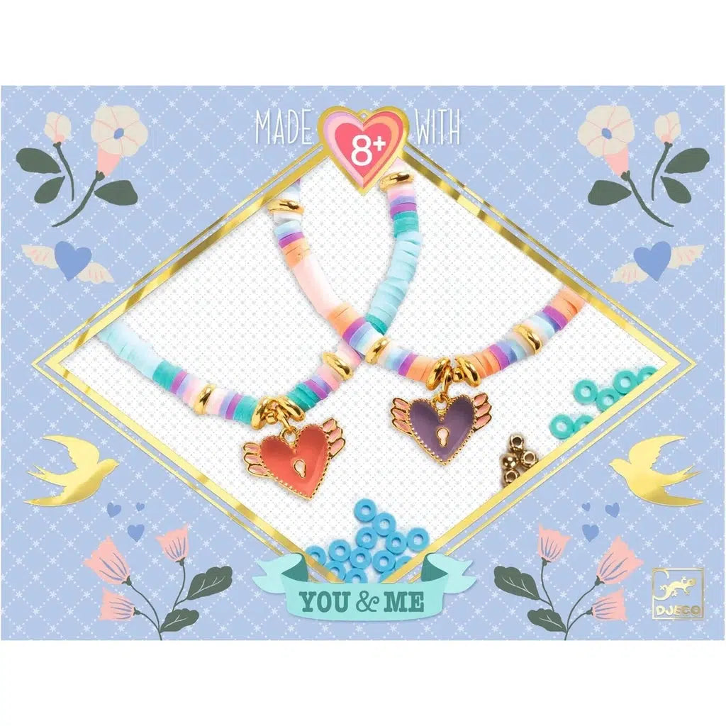 Image of the packaging for the Heart Heishi Beads & Jewelry craft kit. On the front is a picture of what the finished product could look like.