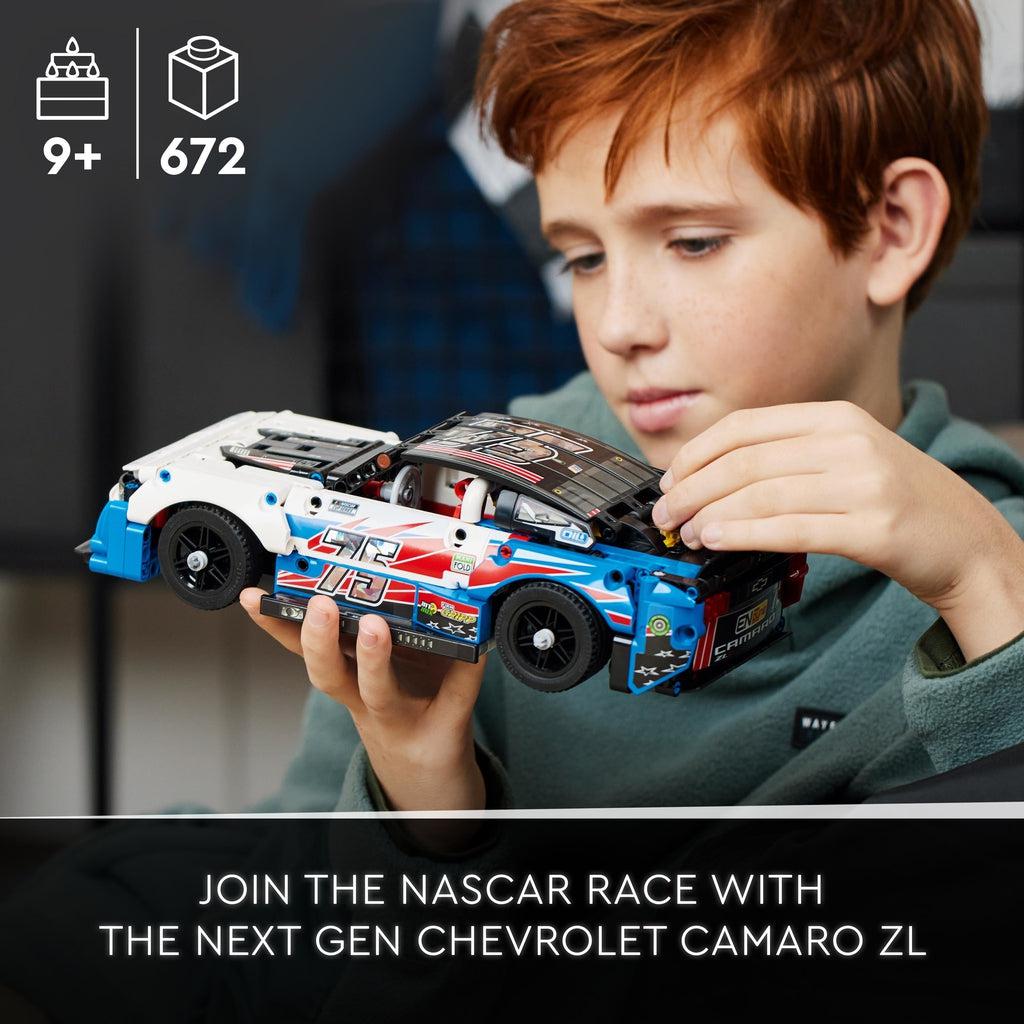 kid examining the completed lego build | Text reads: Join the nascar race with the next gen chevrolet camaro zl | piece count of 672 and age of 9+ in top left