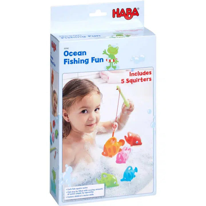Image of the packaging for the Ocean Fishing Fun bath toy. On the front of the box is a picture of a little girl playing with the toy in the bath.