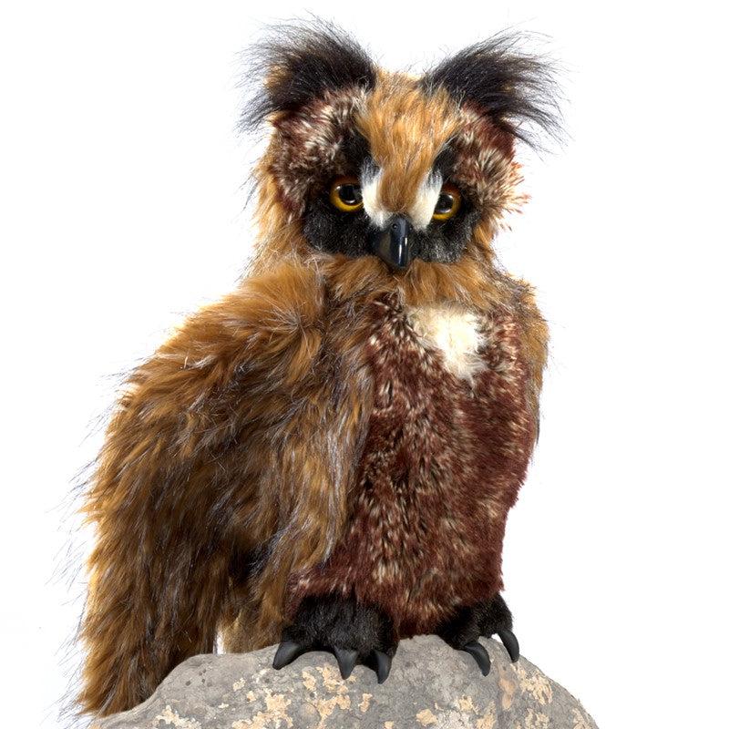 Large owl puppet | Owl has brow feather-like fur. The chest and face of the owl are a darker brown, and the face "horns" are black. | Yellow and black plastic eyes, black plastic beak, and black feet with leathery claws.