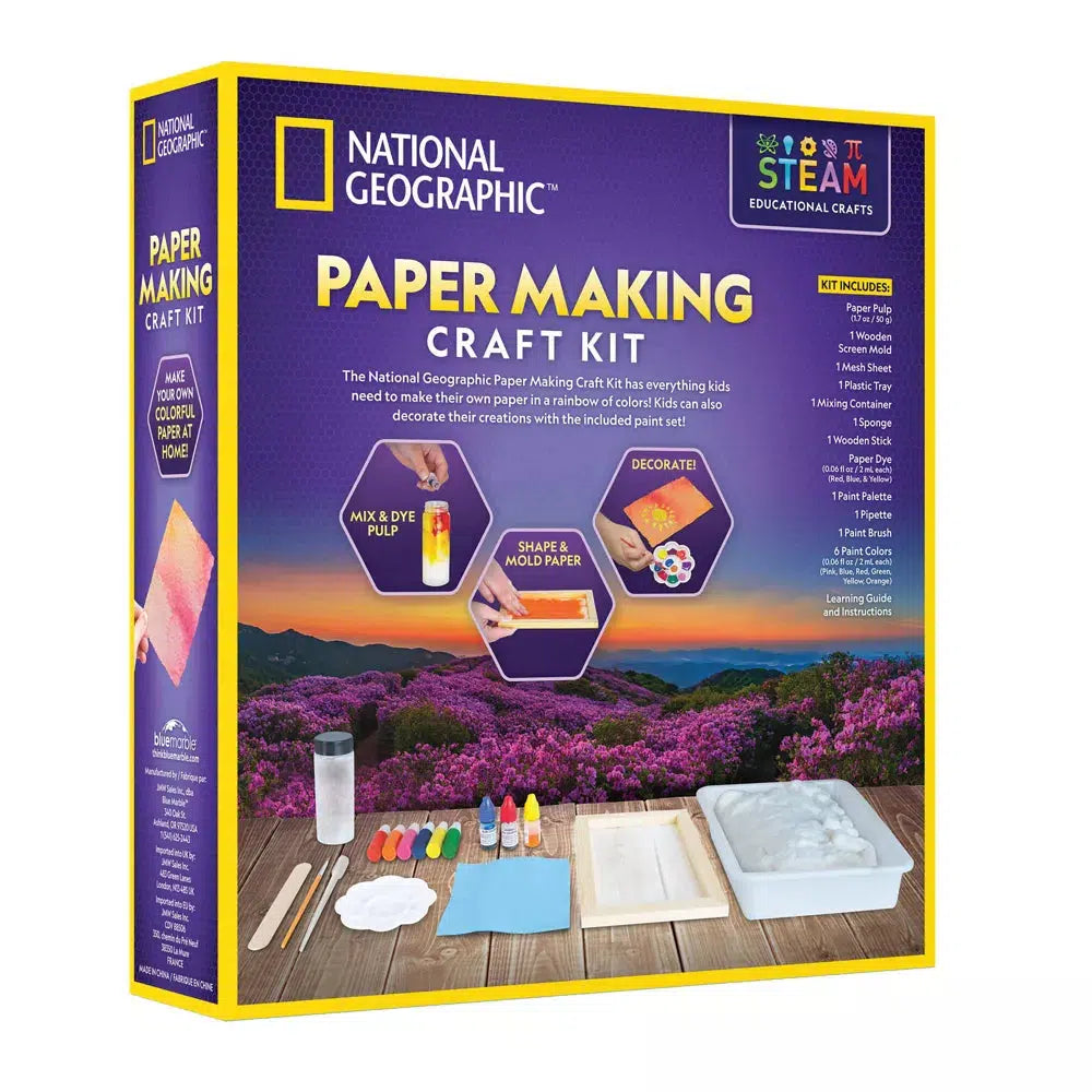 image shows the paper making craft kit back of box. three hexagons in the center show instructions, reading "Mix dye & pulp", "shape and mold paper", and "decorate!" the items in the box, dye, pulp, paint, brushed are all neatly laid out at the bottom of the box 