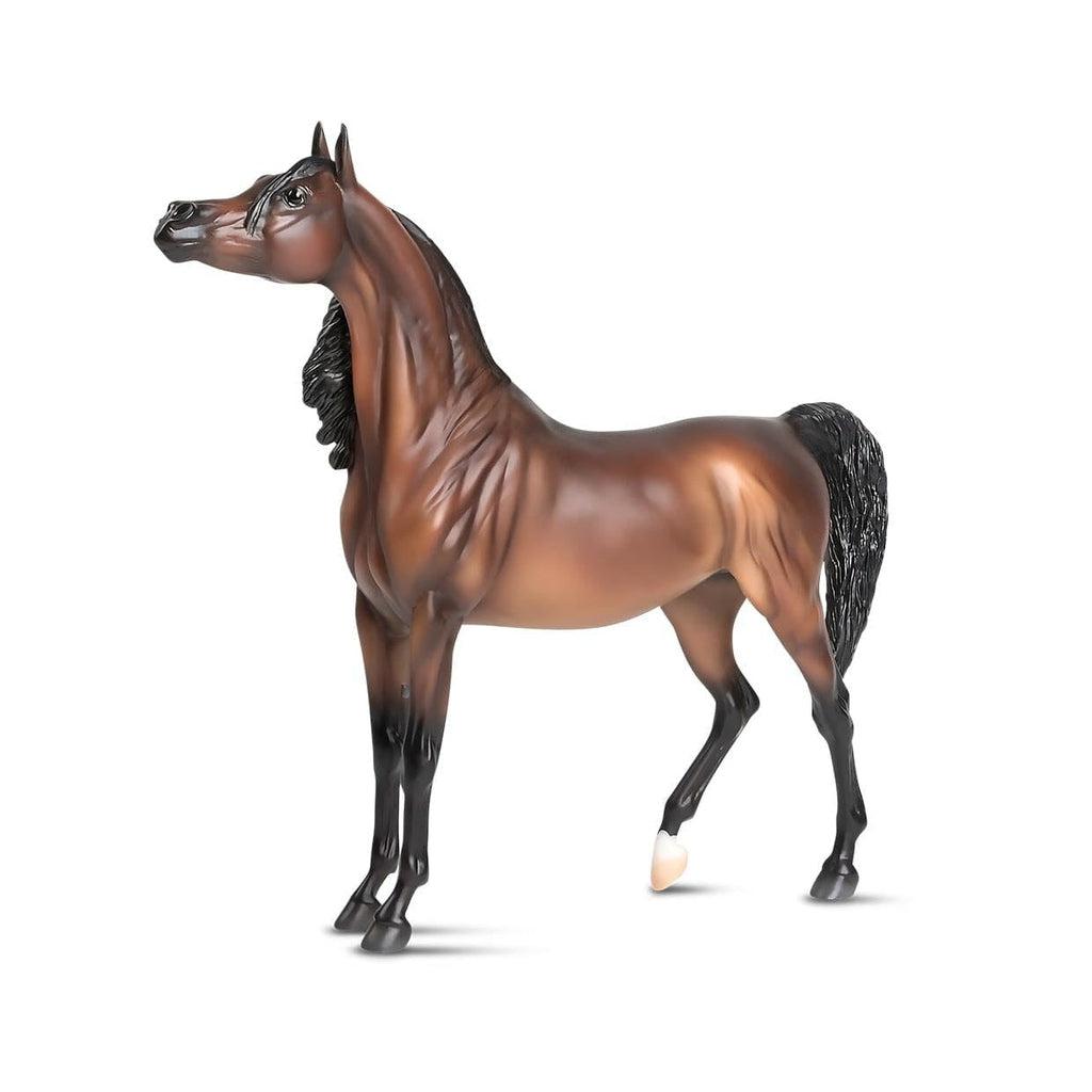 Image of the RD Marciea Bey figurine. It is a toned brown horse with black mane, tail, and legs.
