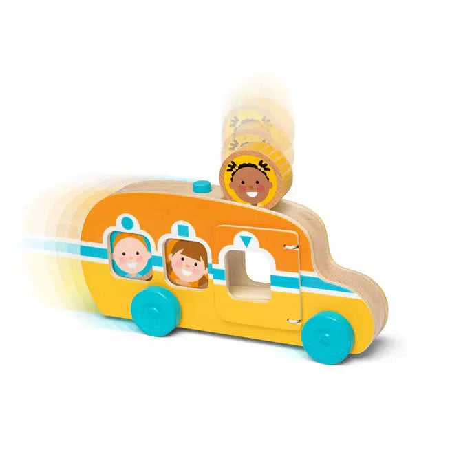 Image of the bus outside of the packaging. It is orange and yellow colored with a light blue racing stripe. (The wheels are also that same color). The bus can store up to three character disks and they can be inserted through a hole in the top of the bus.
