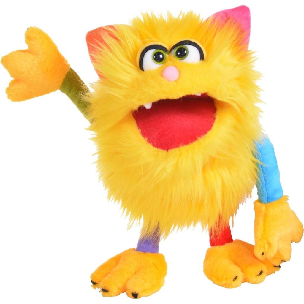This image shows Sassy the cat monster! she has yellow fur that is very fluffy making her look round