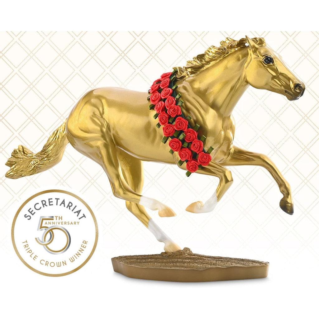 Image of the Secretariat 50th Anniversary figurine. It is a golden statue of the famous horse with fake prize winning roses rested across its back. It is set in a running postition.