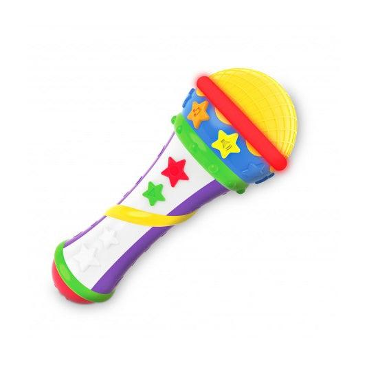 Image of the toy outside of the packaging. It is brightly colored with symbols of stars all over it. It has different buttons for volume and music.