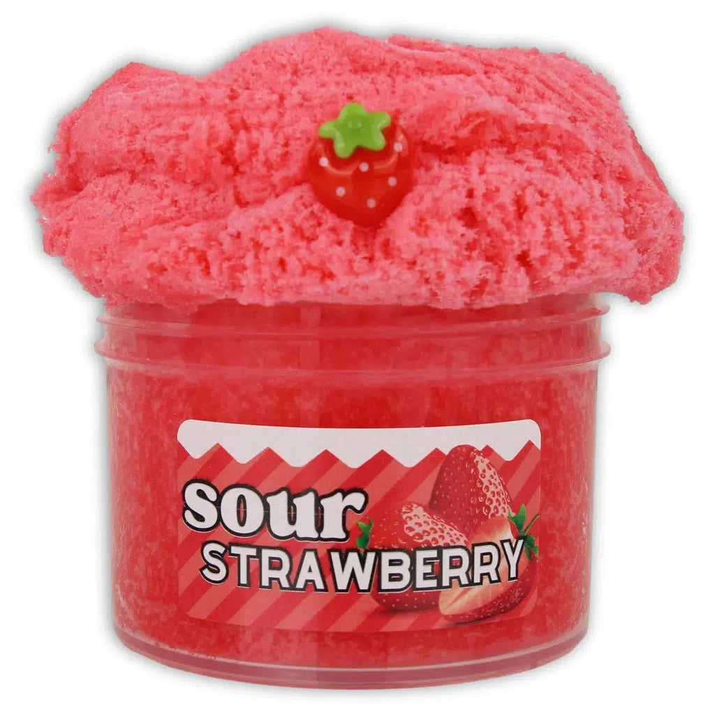 Image of the open Sour Strawberry slime. It is a completely pink/red slime that is fluffy. It comes with a strawberry charm.