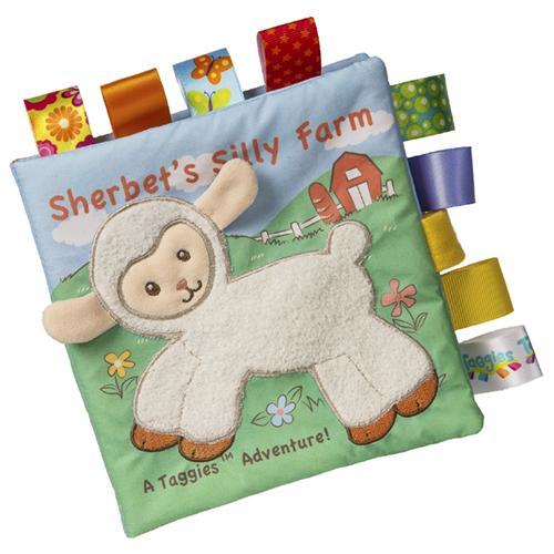 Image of the Taggies Sherbet Lamb Soft Book. On the cover is an embroidered lamb in a meadow at a farm with the title "Sherbet's Silly Farm". Each page of the book has a ribbon loop of varying patterns attached to it.