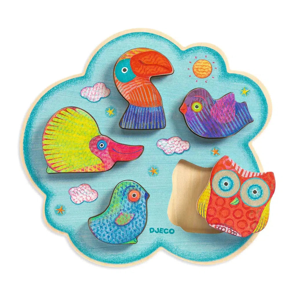 Image of the wooden puzzle board. The background board is shaped like a blue cloud and has wooden bird puzzle pieces on top.