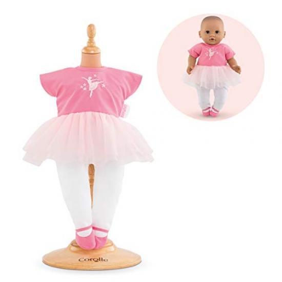 The clothes consist of a pink short sleeved shirt with a white ballerina on it, a pinkish white tutu, white tights, and pink shoes, all attached together and in one piece. The image also shows a baby doll wearing the clothes