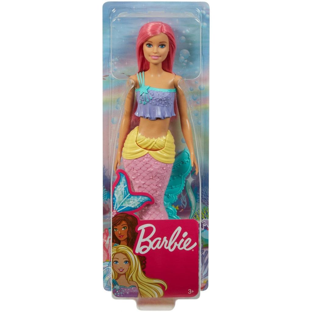 The mermaid barbie is shown in it's plastic packaging. The front of the box contains a barbie logo