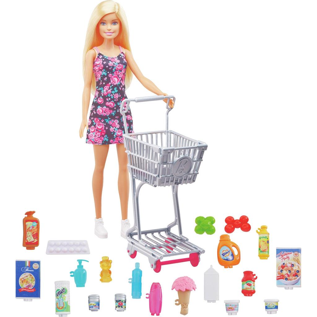 Image of all the included pieces outside of the packaging. The set includes Barbie, a shopping cart, and many different various food and cleaning products.