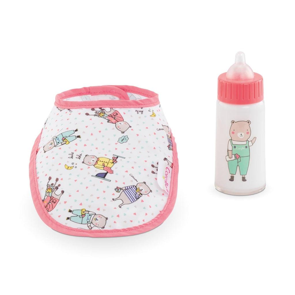 This set includes a bib with bear characters printed on it and a clear baby bottle with a bear character on it, a think wall of "milk" to give the appearance that it's full, and a red top.