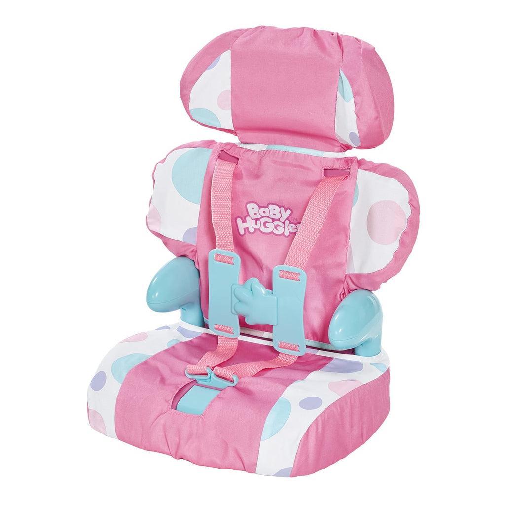 The booster seat is a light blue plastic seat covered in padding fabric that is pink with parts that are white with blue and pink circles. It features a headrest, arm rests, and two straps that buckle in front of the doll with a kid friendly buckle.