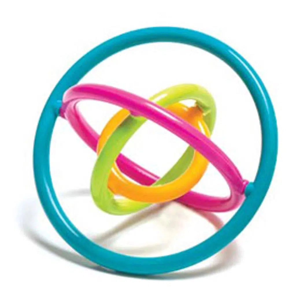 Image is of a Gyrobi. It is a series of 4 concentric circles attacked in a way that they can spin. It is multicolored. It is teal, pink, lime, and yellow.