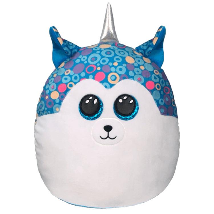 Image of the Helena plush. It is a blue husky dog with different colored spots on the blue part. It has a silver unicorn horn.
