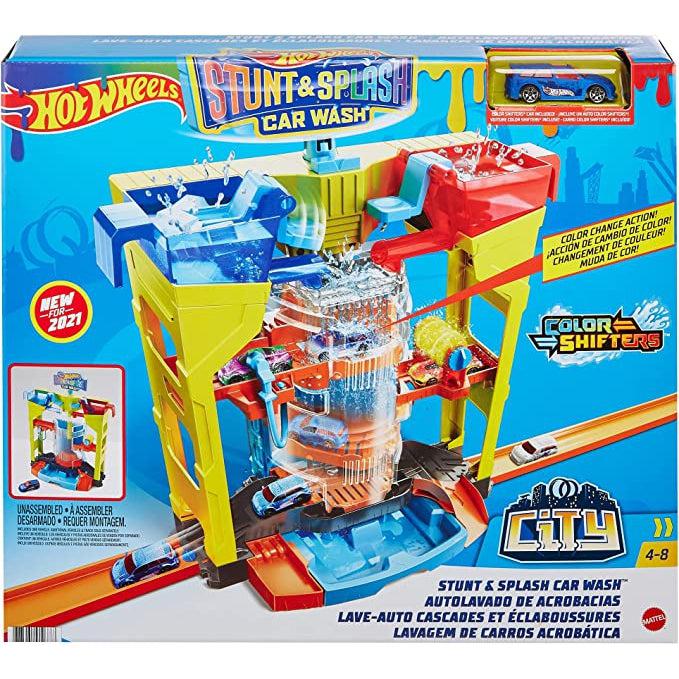 Image of the packaging for the Hot Wheels Stunt Car Wash. It has a picture of the car wash in motion changing the colors of the Hot Wheels cars.