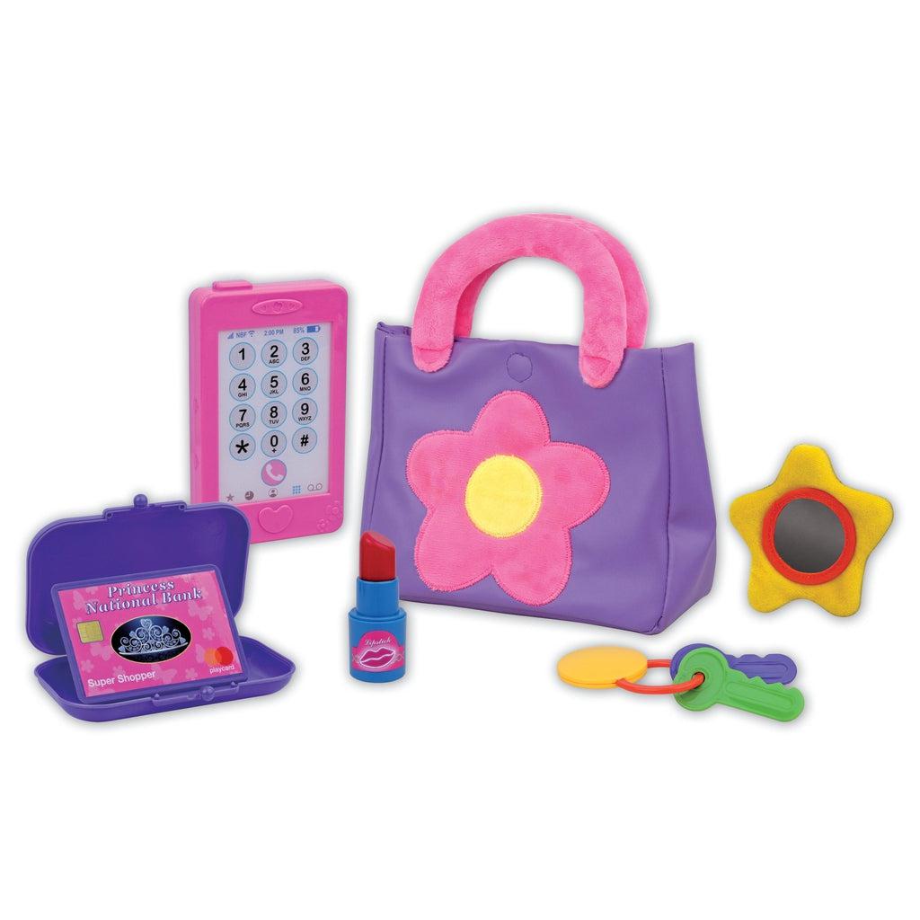 inside is a mirror in the shape of a star, a play phone, play lipstick, a case, and play car keys. the items are all fake, large and plastic