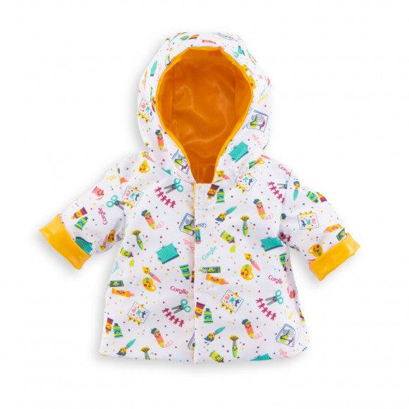 When revearsed this rain coat becomes a white raincoat with cartoony graphics of art supplies printed all over it, and a yellow lining inside.