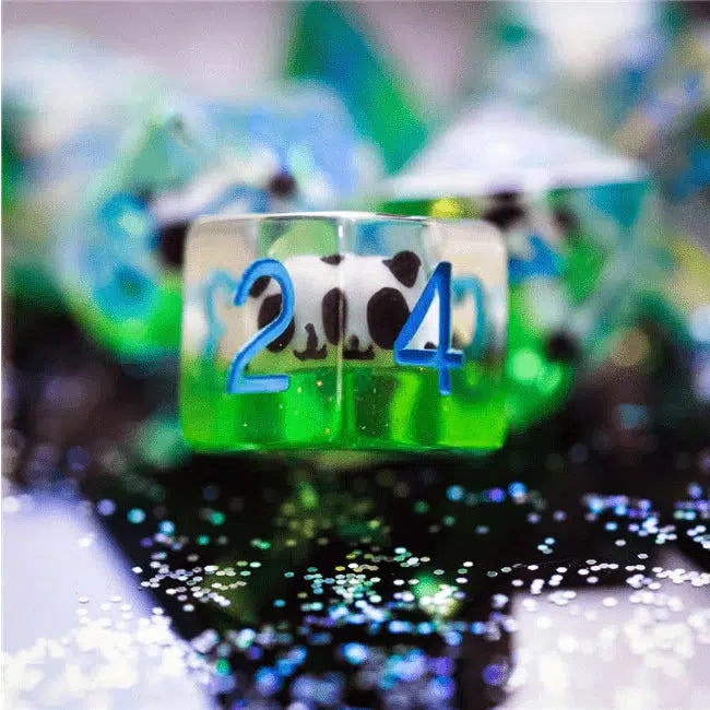 The D4 is shown with the panda in clear view inside the clear resin with green resin below it, giving the impression that it's laying on grass.