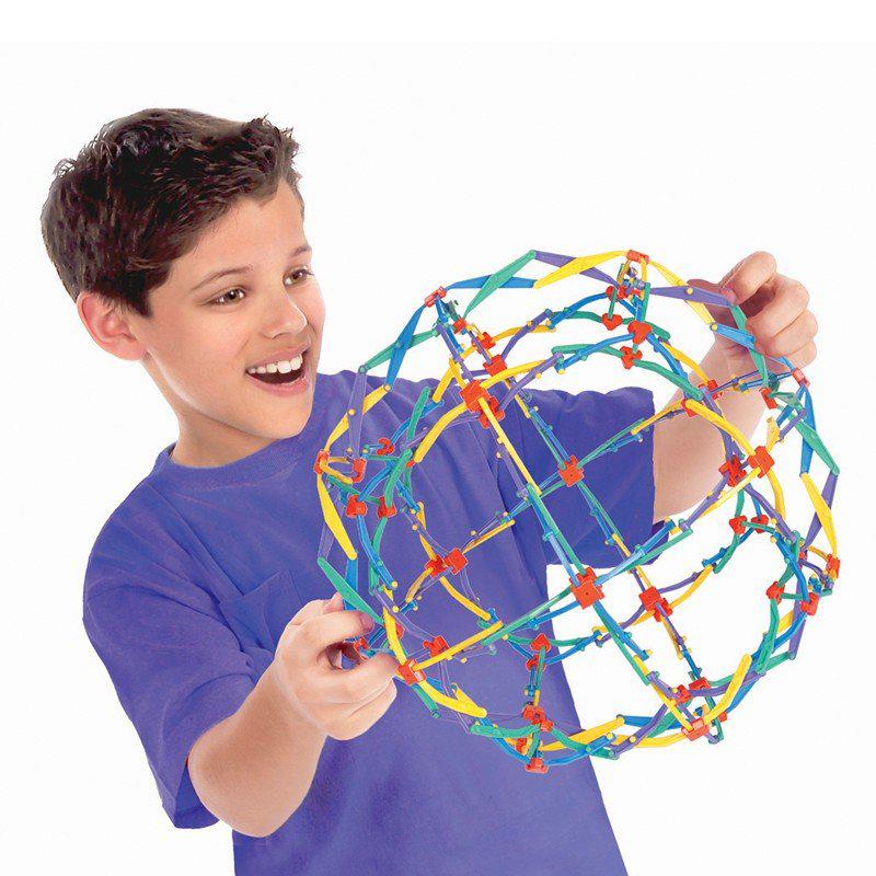 A kid is shown playing with the mini sphere, he has expanded it all the way to it's large size which is bigger than his head.