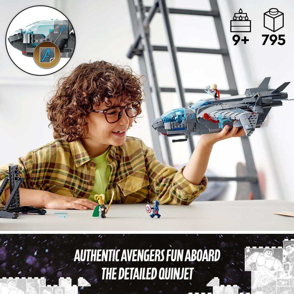 a child is holding the quinjet in front of himself | piece count of 795 and age of 9+ in top right | close up of the avengers logo on the jets side in top left | Image reads: Authentic avengers fun aboard the detailed quinjet