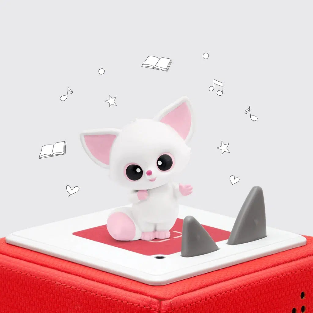 The tonie is a white fennec fox with light pink inner ears, paws, tail tip, nose, and the whites of her eyes are also pink. Figure shown on a red toniebox