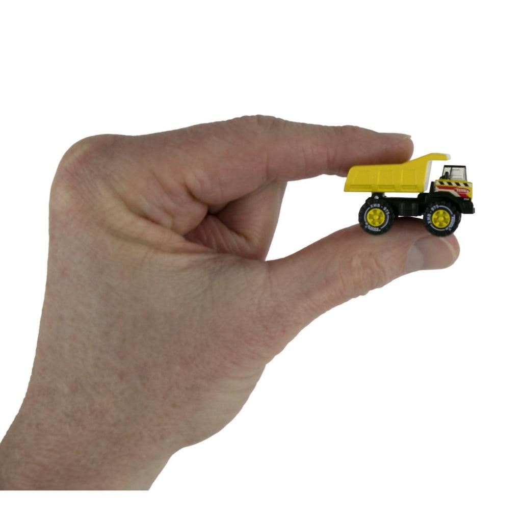 Picture is of a hand holding the truck. The truck is about the size of the thumb.