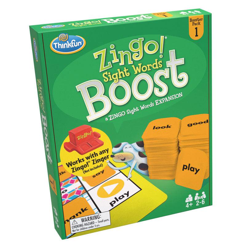Game box | Box is green with large title words. | Includes graphics of Zingo cards, tiles, and dog.