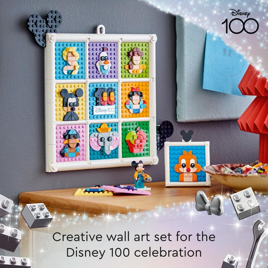 The 3x3 frame of portraits is hung on a wall next to another portrait in the smaller included frame | Text reads: Creative wall art set for the Disney 100 celebration