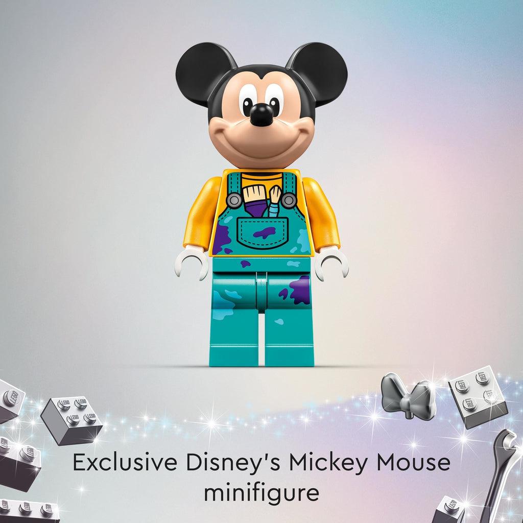 Lego Minifigure of Mickey Mouse is shown, he is in blue paint splattered overalls with paint brushes in the front pocket | Text reads: Exclusive Disney's Mickey Mouse minifigure