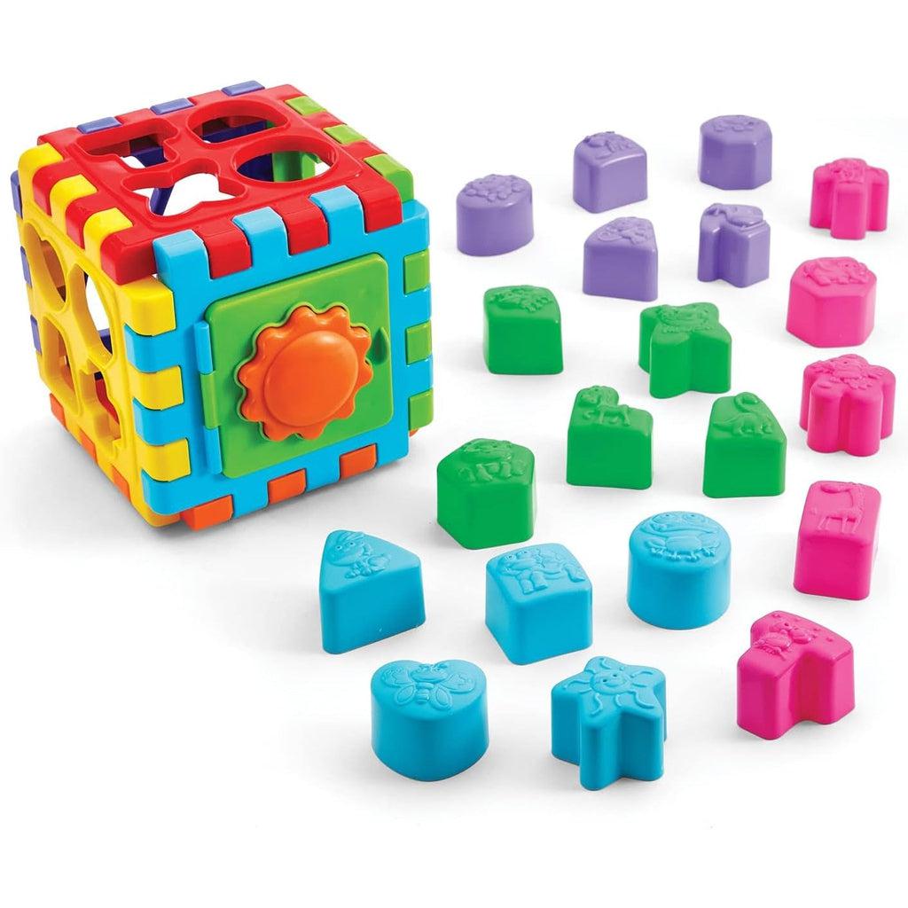 Image of the sorting toy outiside of the packaging. It is a collapsable cube with 20 included differently shaped plastic blocks. Everything is very colorful.
