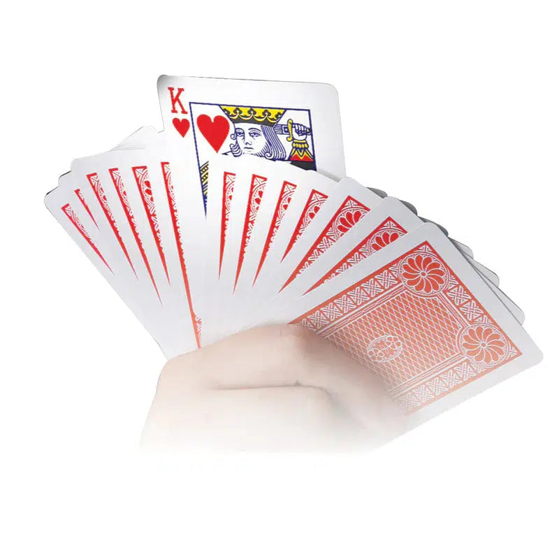 this image shows the backs of cards fanned out in a hand, with one card facing the other way sticking up