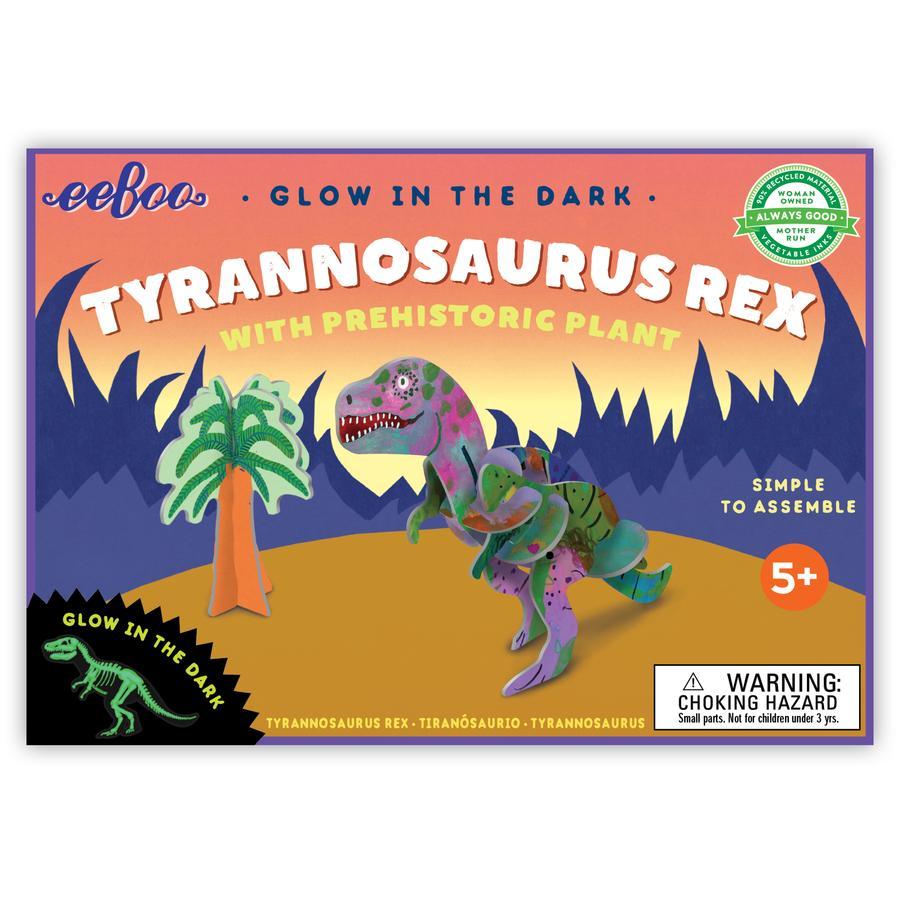 glow in the dark tyrannosaurus rex model withi prehistoric plant.