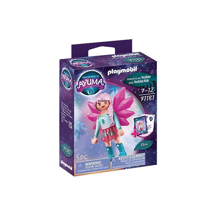 this picture shows the box that the crystal fairly elvi comes in. she is wearing her pink crystal wings and pink skirt. the box also shows that there are some collectible cards inside the box. 