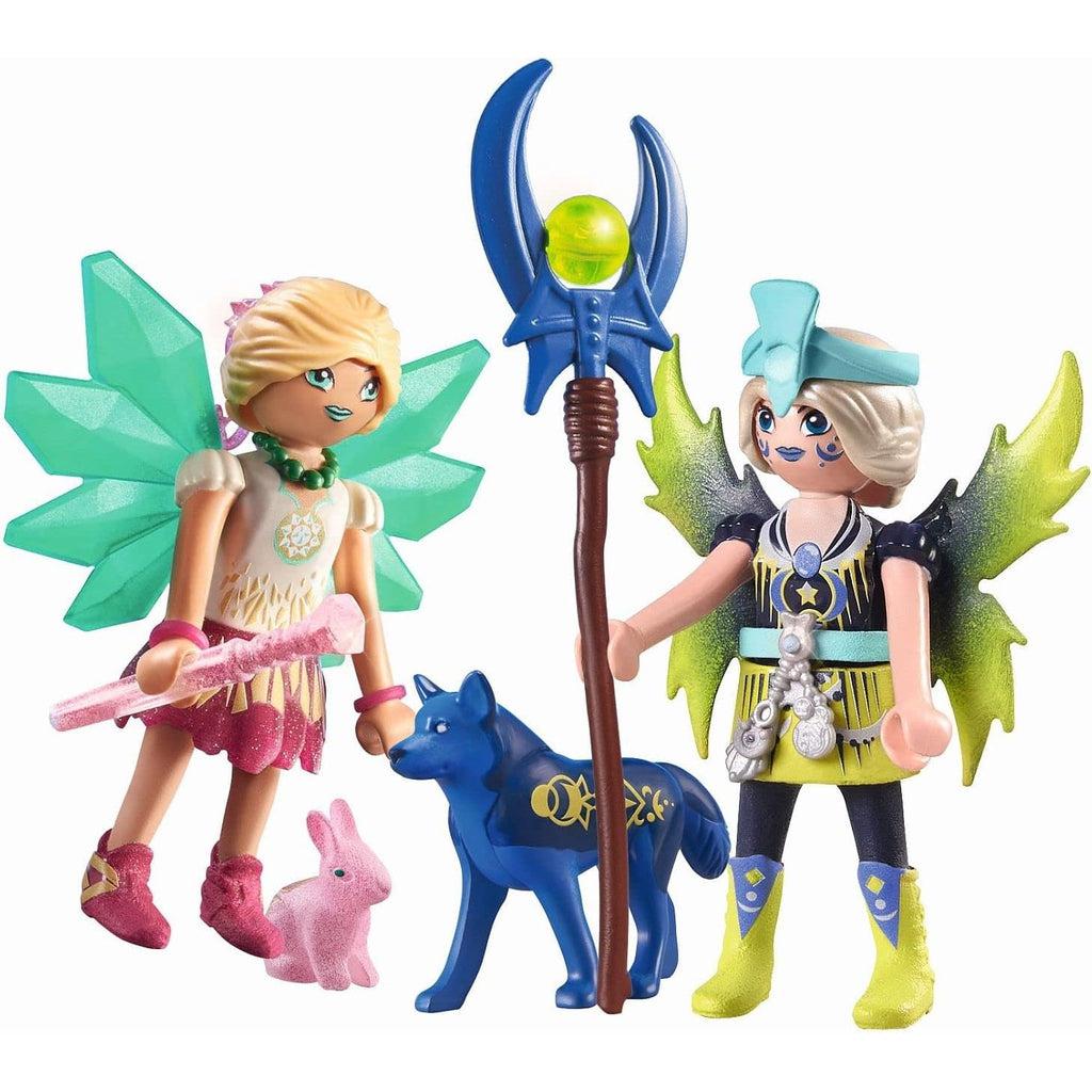 This image shows the two faires holding their wands, one blue and the other pink as they play together nicely with their animals.  