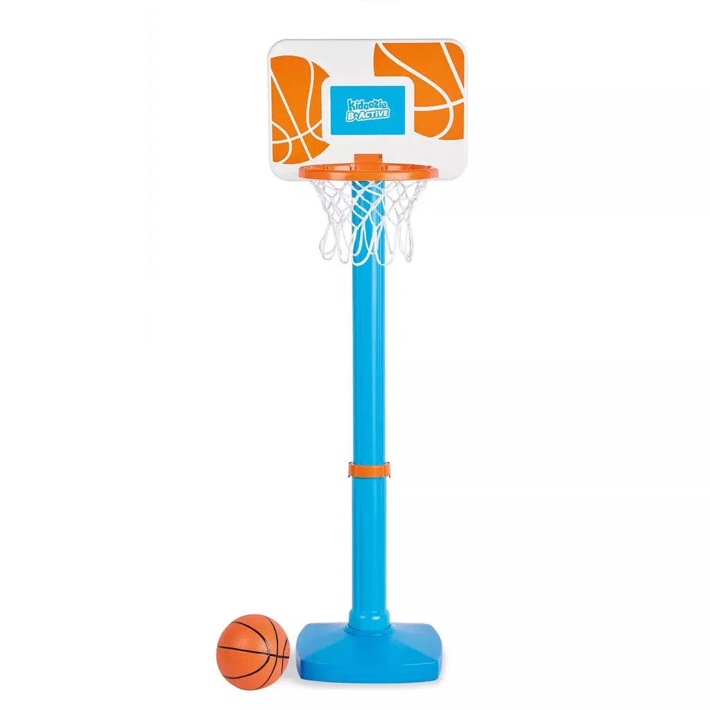 The basketball set fully extended up with the ball next to it. an inflation needle comes with the ball and hoop