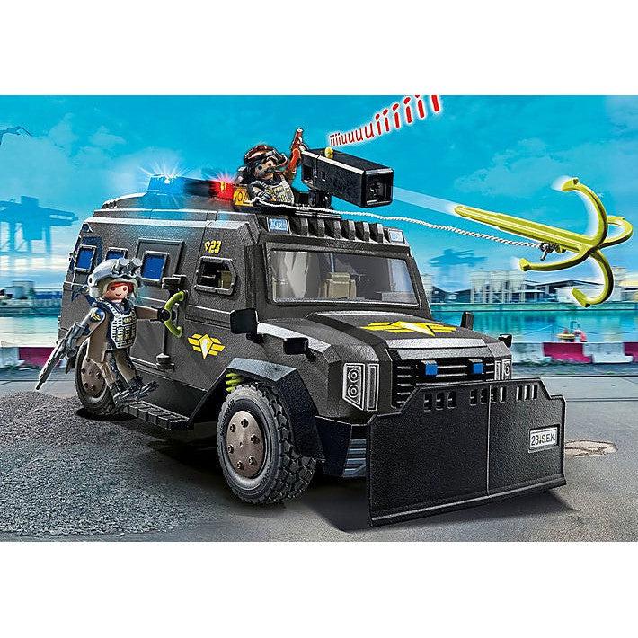 image shows the tactical police unit playmobil. its a black van with a blaster located on the top.