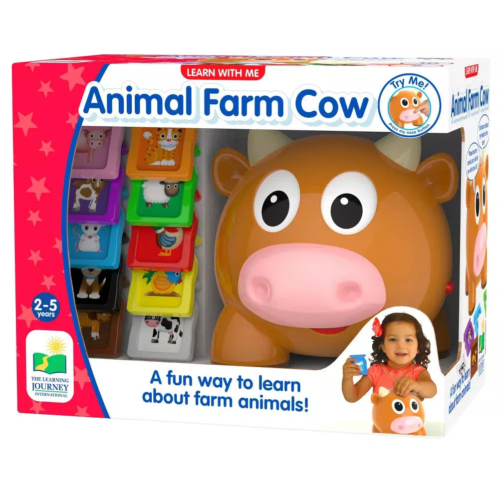 this image shows the animal farm cow in its box, there are several animals in cards that can go into the cow to make sounds and learn